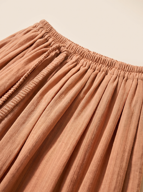 Plisseerock Thea in Apricot